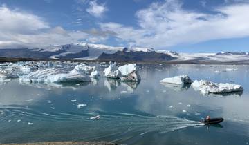 Icebergs in a serene glacial lagoon.