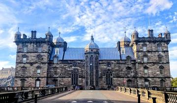 Impressive castle with a blue sky backdrop.