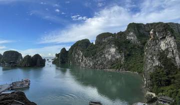 Scenic view of a bay with limestone karsts and boats