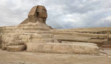 The Great Sphinx of Giza in an open landscape setting.