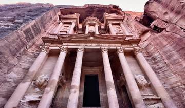 The famous Treasury carved into sandstone in Petra.