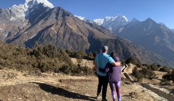 Couple admiring mountain view.