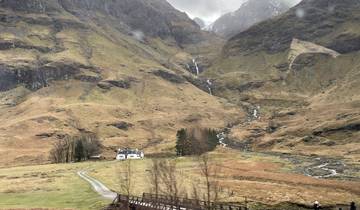 House with a stream and mountains in Glencoe.