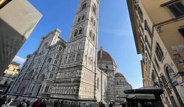 Florence Cathedral with people on the street in foreground.
