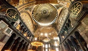 Intricate interior view of Hagia Sophia with ornate ceiling.