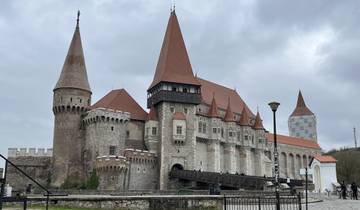 Medieval castle with towers and bridge.