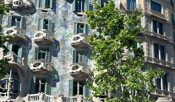 Whimsical facade of a modernist building with tree.