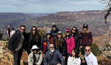 Group posing with Grand Canyon in the background.