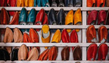 Colorful display of traditional Moroccan slippers.