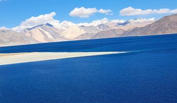 Scenic view of a lake with mountainous horizon.