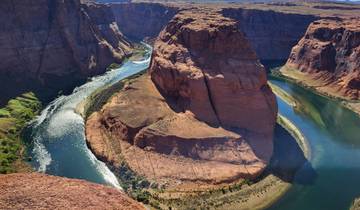 Horseshoe Bend with river curving around a large rock formation.