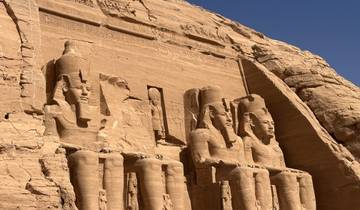 Ancient statues carved into a rock at Abu Simbel.