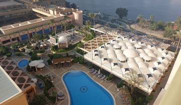 Resort with swimming pools and gardens.