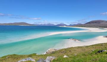 Stunning beach with turquoise water and mountains