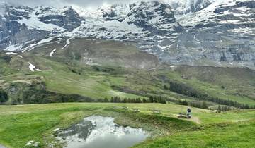 Scenic mountainous landscape with snow-peaked mountains.