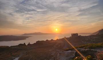 Sunset over the sea and distant islands.