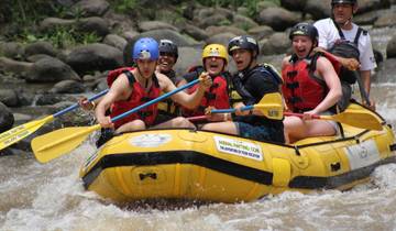 Group of people rafting on a river