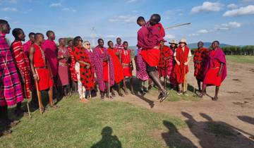 Group of Maasai people performing traditional dance.