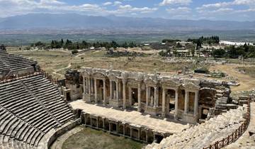 Ancient amphitheater with a detailed view of the stage front.