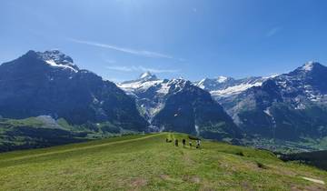Snowy mountain landscape with clear blue skies.