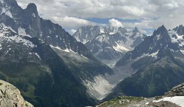 Stunning snowy mountain range with deep valleys.