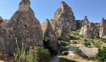 Unique cave-like rock formations with small openings.