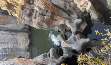 Rock formations with water flowing through them.