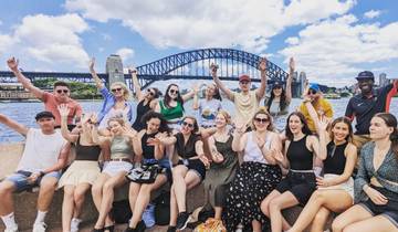 Group gathering with Sydney Harbour Bridge in the background.