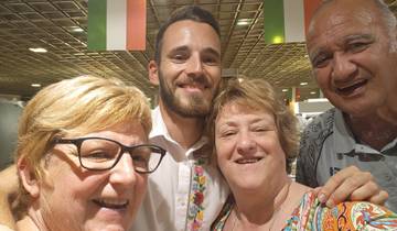 Group selfie with people smiling.