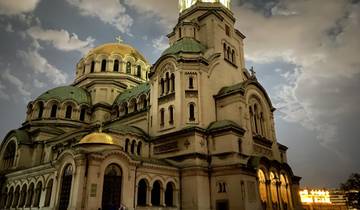 St. Alexander Nevsky Cathedral under a cloudy sky.