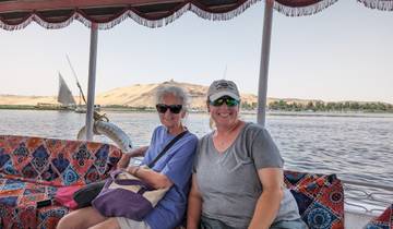 Two women on a boat ride on the Nile.