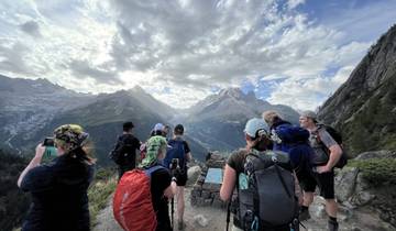 Group of hikers admiring a mountain view.