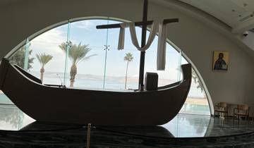 Interior view of a church through a boat-shaped altar.