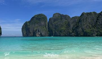 Scenic view of cliffs and turquoise sea.