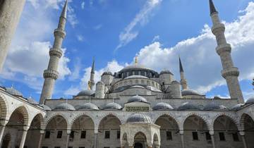 Sultan Ahmed Mosque with blue sky and clouds.