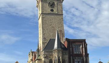 Clock tower of a historic building against the sky.