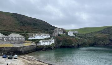 Scenic view of a coastal village next to the ocean.