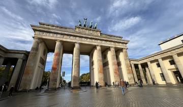 Brandenburg Gate in Berlin with visitors.
