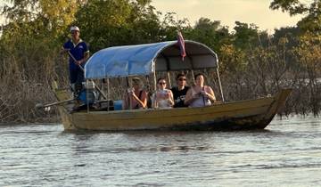 People on a boat ride in a river.