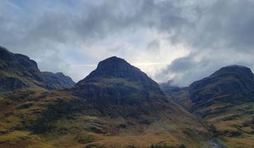 Mountains with a moody sky in the background.