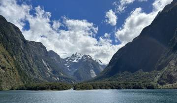 Stunning view of a fjord with snow-capped mountains.