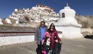 Family posing in front of a monastery at Leh.