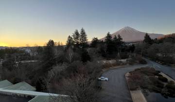 Scenic view of Mount Fuji with surrounding landscape.