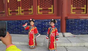 Children dressed in traditional attire posing.