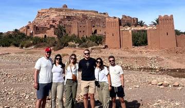 Group photo in front of an ancient fortified village.