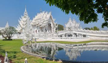 The stunning White Temple with reflection in a pond.