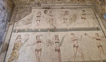 Ancient mosaic artwork depicting athletic scenes.