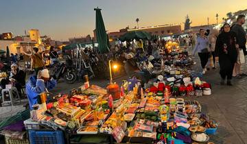 Bustling night market with people and stalls.