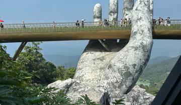 Golden Bridge with a giant stone hand in Vietnam.