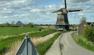Traditional Dutch windmill in the countryside.